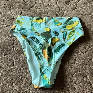 This is the bottom piece to the bikini. It’s very tropical as well and very soft